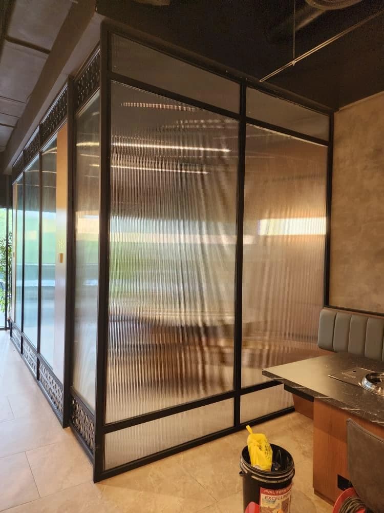 Glass-walled private dining room at GOSANCHON